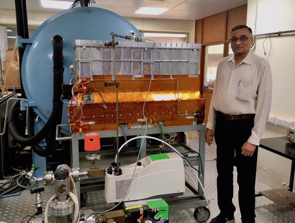 Dhiraj Dedhia (Scientific Officer, Tata Institute for Fundamental Research) with flight spare of the Large Area X-ray Proportional Count.