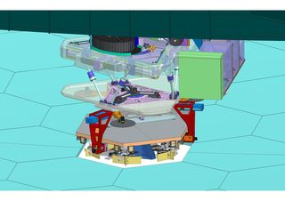 The Segment Handling System (SHS) and its precision robotic hand, which traverses under the bridge (inset)