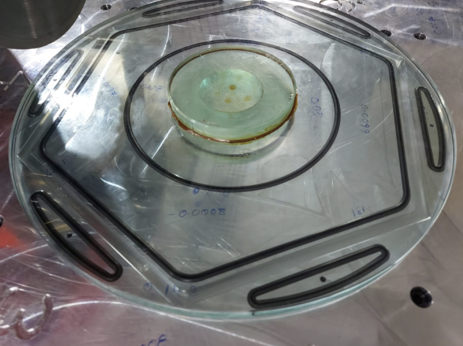 Test setup for cutting a circular piece of sample glass.